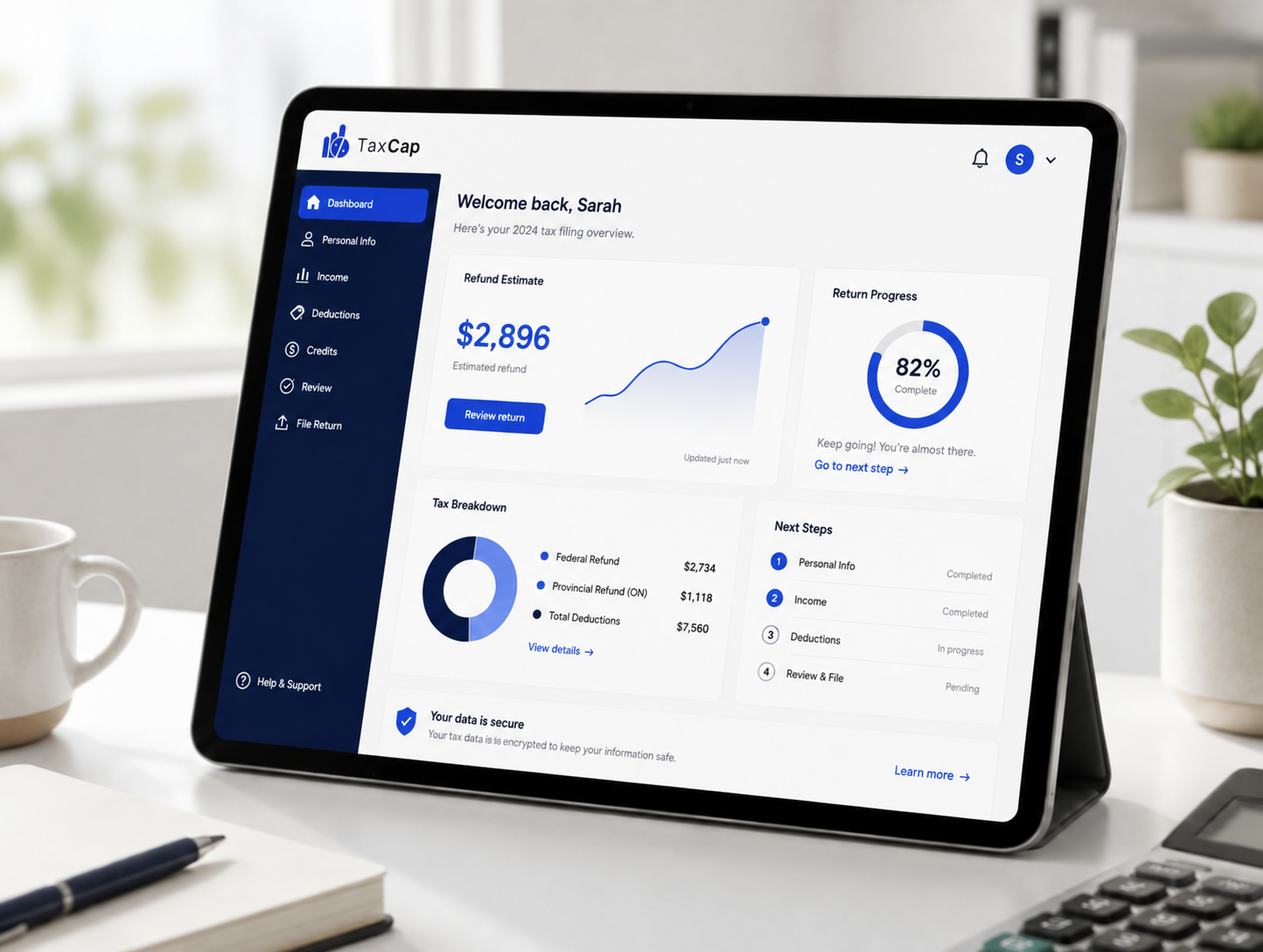 Tablet showing the TaxCap online tax filing dashboard with refund estimate and return progress